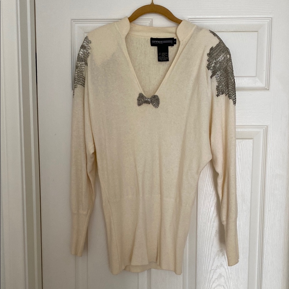 Cream Cardigan with V-Neck and Shoulder Embellishments